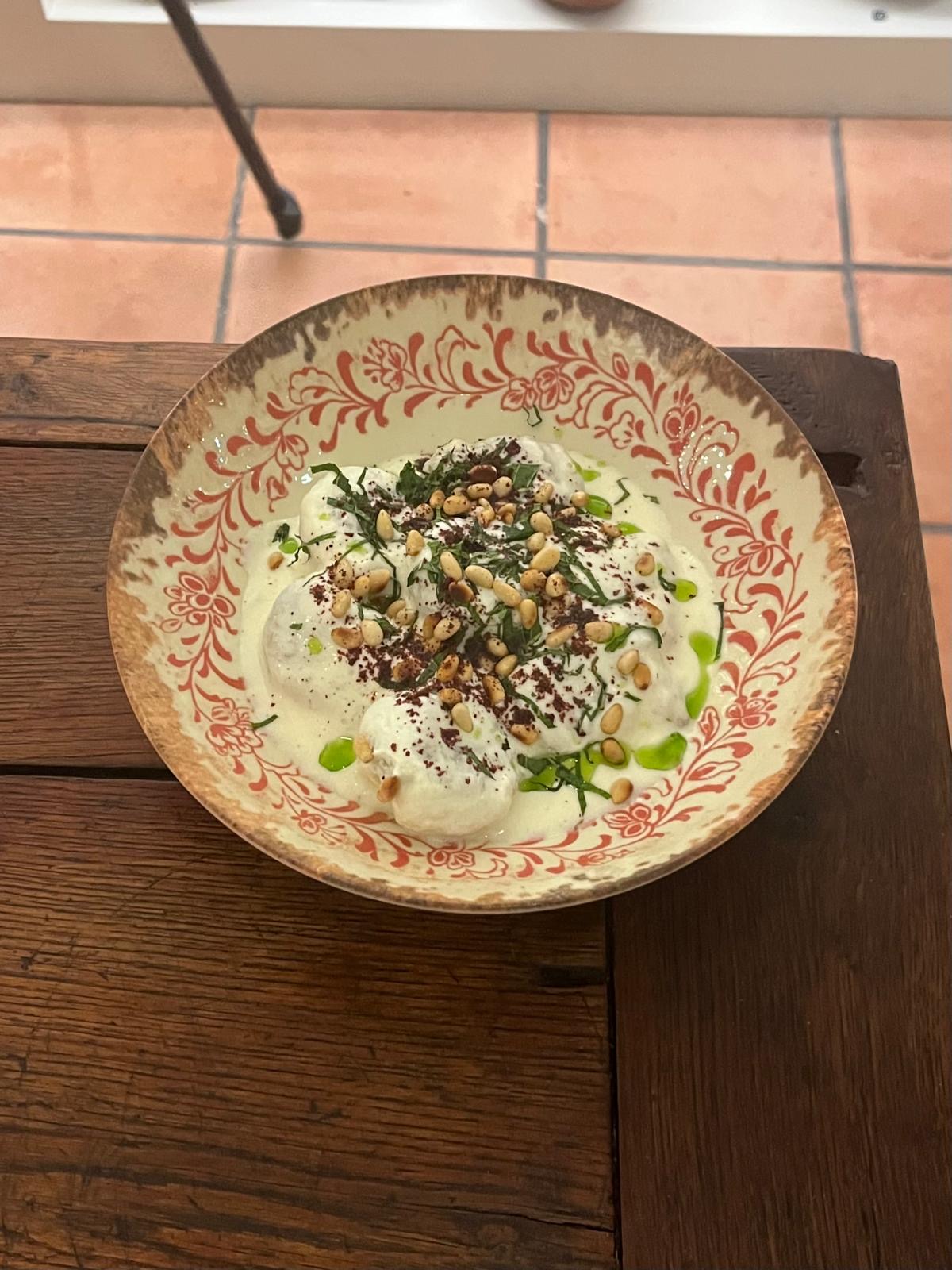 Creamy labneh with herbs and toasted pine nuts