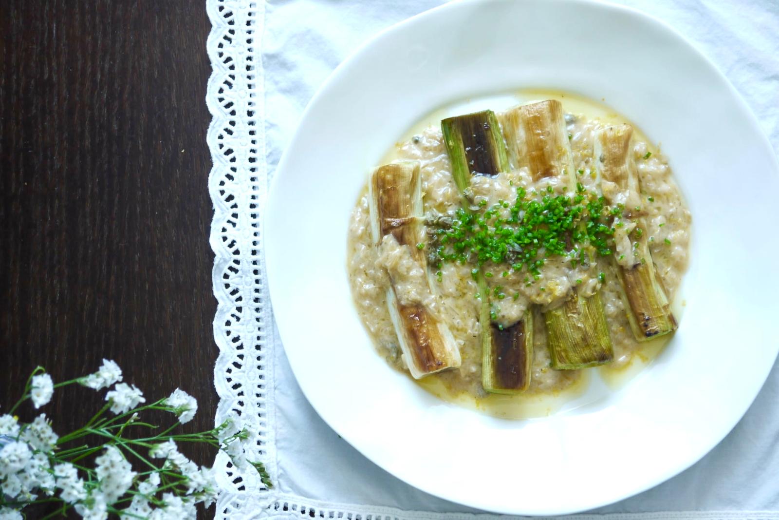 Creamy risotto topped with roasted leeks
